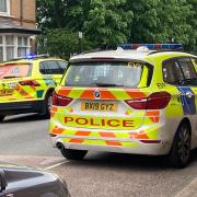 A police car and a paramedic's vehicle in Duncombe Road, Archway
