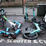 Scooters piled up outside the The Highgate Literary and Scientific Institution in Pond Square