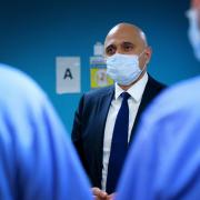 Health Secretary Sajid Javid (centre) during a visit to the Mile End Diagnostics Centre, east London, as he sets out plans to tackle the huge NHS care backlog caused by the pandemic. Picture date: Tuesday February 8, 2022.