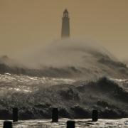 Waves crash into the beach as the tail end of Storm Corrie moves through Blyth in Northumberland