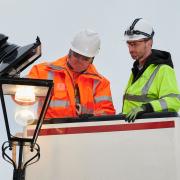 Cllr Adam Harrison, on the right, inspecting the replacement of streetlights with LED lamps on Downshire Hill, Hampstead. On the left is Geoff Moore, an electrician with Enerveo, the company undertaking the works on behalf of Camden Council