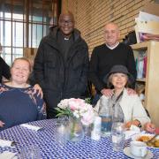 HNCC Wellness Cafe at St Michael’s Church, Highgate. From left volunteer Mrs O’Neill, Siobhan Tazarni, Rev Kunle Ayodeji, HNCC director Andrew Sanalitro, and lunch guests Sheila Prestridge and Mei-Tak Yeh.