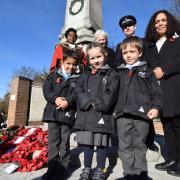 Camden Cllr Sabrina Francis, speaker Anthea Ionides, Chf insp Richard Berns and service leader Rev Kate Dean with reception pupils from Hampstead Hill School Zacharus Khan, Ellie Taylor and Arnold Schipka at the Interfaith Remembrance service at the