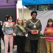 Mayor of Camden Sabrina Francis visited pupils selling vegetables to raise awareness about healthy eating in school