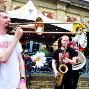 The Heavy Beat Brass Band play outside Palm Court at Ally Pally's StrEATlife Festival
