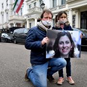 Richard Ratcliffe with his and Nazanin's daughter Gabriella outside the Iranian Embassy