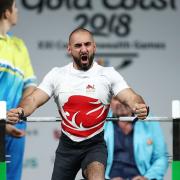 Ali Jawad of England celebrates a lift in the men's lightweight final during the Para Powerlifting on day six of the Gold Coast 2018 Commonwealth Games (pic Mark Metcalfe/Getty Images)