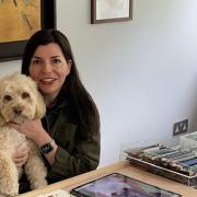 Artist Deborah Cornes with her dog Tito - who has been the inspiration behind a change in career