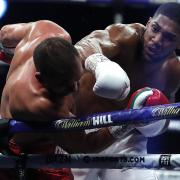 Anthony Joshua (right) in action against Kubrat Pulev during their IBF, WBA, WBO & IBO Heavyweight World Titles bout at the Wembley Arena, London.