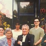 Four generations of the Moreno family have been involved in running their West Hampstead wine shop. Here Abbi Moreno is with her then-infant son Dillon, and family members Salome, Joy, Juan, Marcel and Manuel. Picture: Abbi Moreno