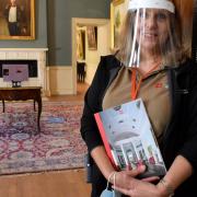 Maria Ioannou, a 'house explainer' at Kenwood House, at the door to Lord Mansfield's dressing room. Picture: Polly Hancock