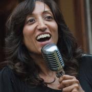 Shazia Mirza performs at a Hornsey and Wood Green Amnesty Group  summer music night and party in 2014. Picture: Nigel Sutton