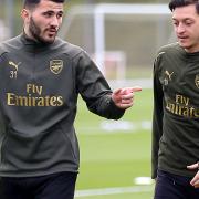 Arsenal's Sead Kolasinac (left) and Mesut Ozil. Kolasinac fought off two men wielding knives after he and Arsenal teammate Ozil were confronted by masked aggressors on Platts Lane, Hampstead. Picture: Nigel French/PA Wire