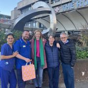 Lauren MacDonald, centre, returns to the Royal Free where last Christmas liver transplant co-ordinator Michael McHugh (second left) operated to save her life