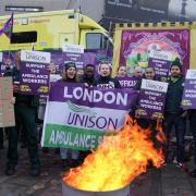 Ambulance workers on the picket line outside Waterloo ambulance station on December 21