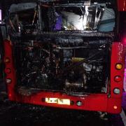 A passenger treated for smoke inhalation after double decker's engine catches fire