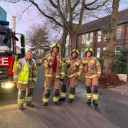 Ex pupil Steven Cronin amongst fire crew who successfully tackled a fire in a storage room at William Ellis School