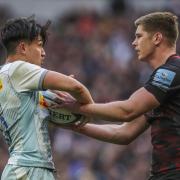 Marcus Smith and Owen Farrell battle for the ball