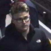 Police believe this man has information that may assist the investigation after a Camden tube station worker was injured stopping a fight