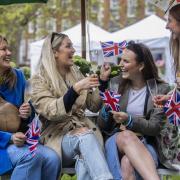 Members of the public at the Mayfair Coronation Garden Party in Grosvenor Square