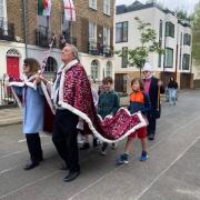The crowning of 'Queen' Anne-Marie Salmon and 'King' Paul Watkins at the Lords of Misrule coronation ceremony in Camden