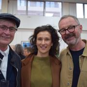 Artist Craig Barnard, Luther and Game of Thrones actor Indira Varma, and artist Mark Entwisle at the opening of Crouch End Open Studios' group exhibition