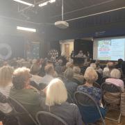 A hall full of Highgate villagers attend meeting about Highgate School plan