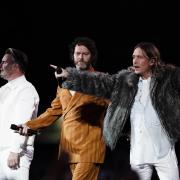 (left to right) Gary Barlow, Howard Donald and Mark Owen from Take That performing on stage at BST Hyde Park