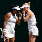 Heather Watson and Harriet Dart discuss tactics at Wimbledon