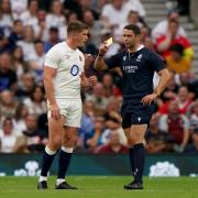 Owen Farrell is shown a yellow card during England's clash with Wales