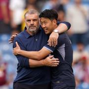Tottenham boss Ange Postecoglou and Son Heung-min celebrate