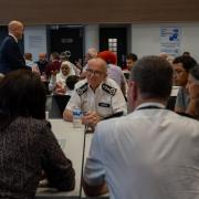 Met commissioner Sir Mark Rowley sitting down with Camden's community