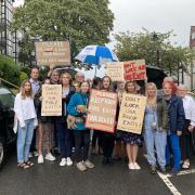 Holly Lodge community at an earlier protest against fire exit closures in September. Now some say a new fire alarm system is too sensitive.