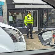 Police pictured outside Darna in Golders Green