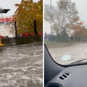 Cars were filmed driving through heavy flooding on A41 earlier today