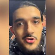 British Transport Police would like to speak to this man after a 'racially aggravated altercation' aboard a train on Sunday (November 26)