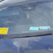 Caught in the act... parking ticket for motorist using Blue Badge fraud (stock image)