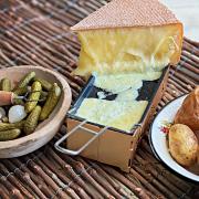 Raclette is both the name of the cheese and the dish which Kerstin serves with pickles and potatoes. Image: Kerstin Rodgers