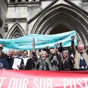 Former post office workers celebrate outside the Royal Courts of Justice, London, after having their convictions overturned by the Court of Appeal  Image: PA
