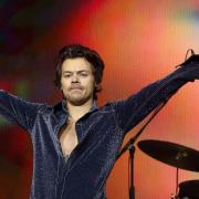 A woman is accused of stalking Harry Styles