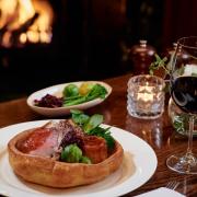 The new Sunday roast at The Great Central Pub at Marylebone's Landmark Hotel features a giant Yorkshire pudding filled with roast sirloin and  veg