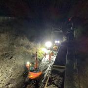 Network Rail has been working overnight to clear debris from the landslip