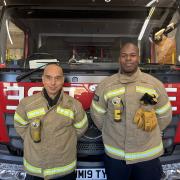 Firefighter Paul Fergus and sub-officer Zafer Nadji, who rescued a woman from a ferocious blaze caused by an e-scooter