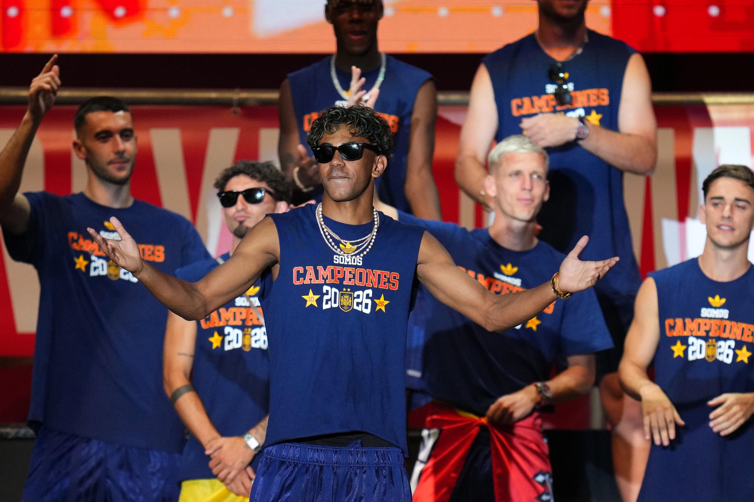 Spain revel in World Cup win with open-top bus parade around Madrid