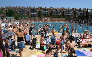 Parliament Hill Lido on a busy summer's day
