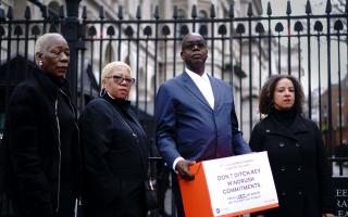Windrush campaigners (l- r) Janet McKay-Williams, Glenda Caesar, Patrick Vernon and Dr Wanda Wporska hand in a petition to Downing Street calling on the Home Secretary to honour the promises of her predecessor (Image: PA)
