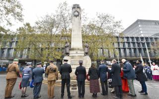 A moment of reflection at the Act of Remembrance and Laying of Wreaths – London and North Western Railway Company War Memorial at Euston Station.
