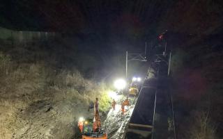 Network Rail has been working overnight to clear debris from the landslip