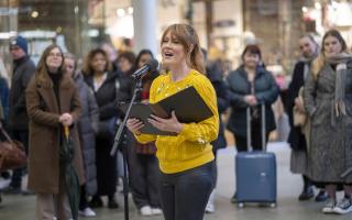Camilla Kerslake singing opera at St Pancras station